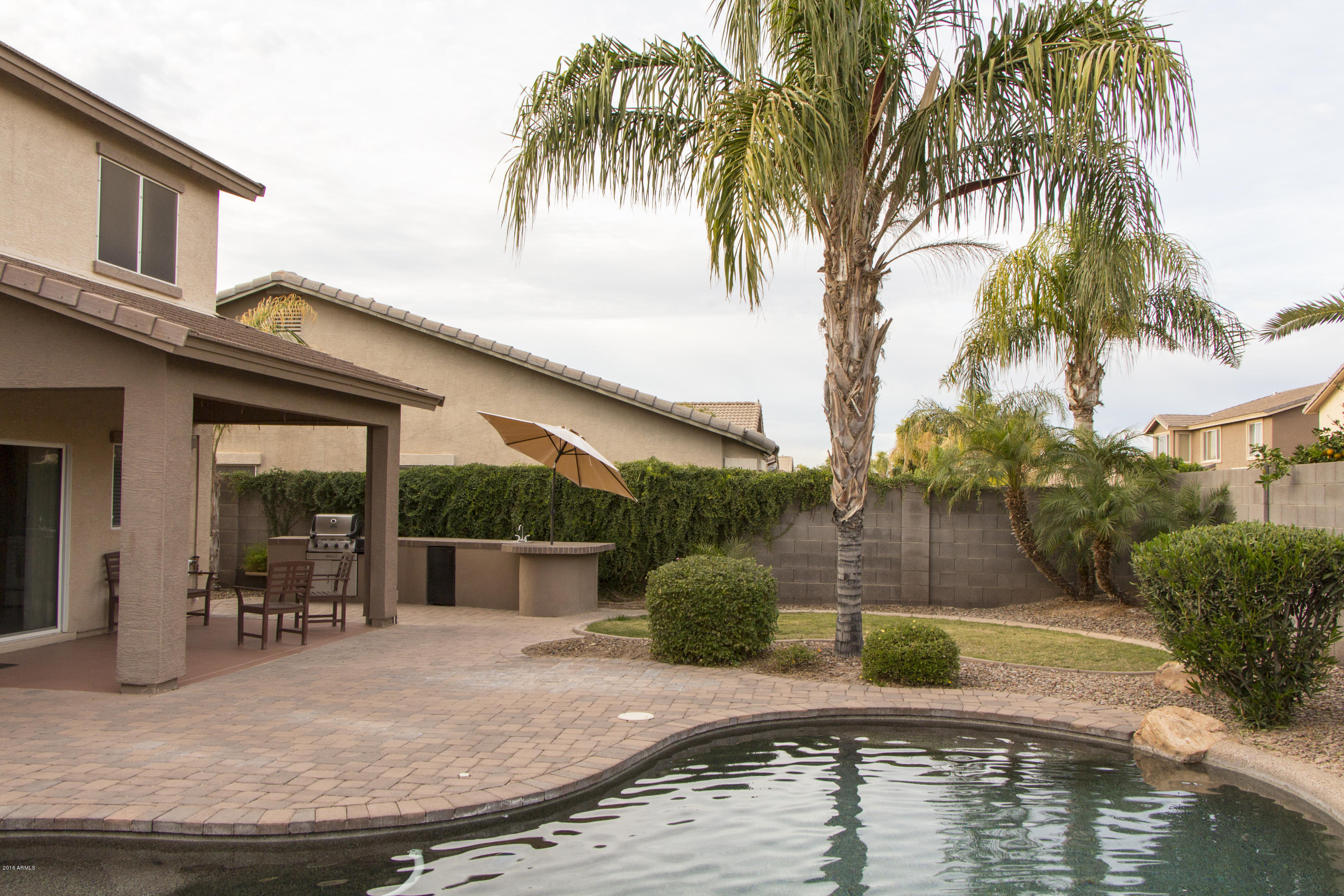 3517 South Sawmill Road Gilbert, AZ 85297 - Photo 2 of 26 a view of a backyard of a house