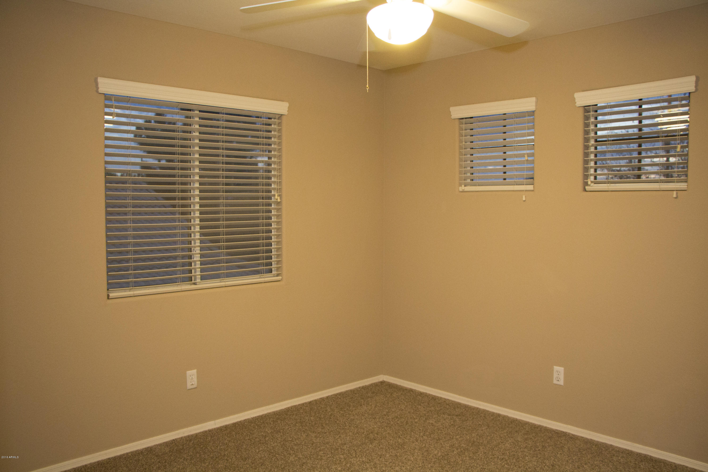 3517 South Sawmill Road Gilbert, AZ 85297 - Photo 21 of 26 a view of an empty room with a window