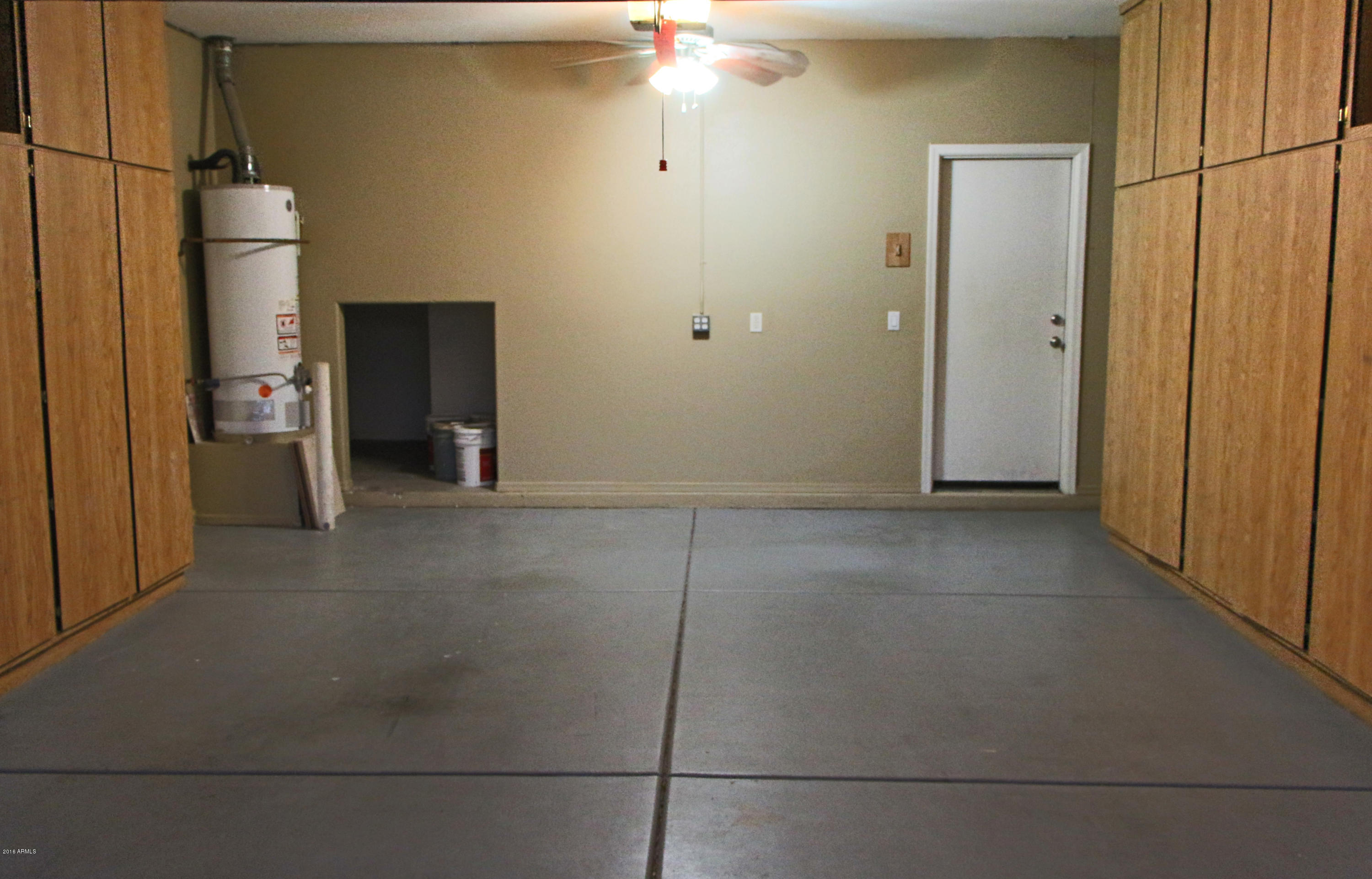 3517 South Sawmill Road Gilbert, AZ 85297 - Photo 24 of 26 a view of a livingroom with a storage & utility room