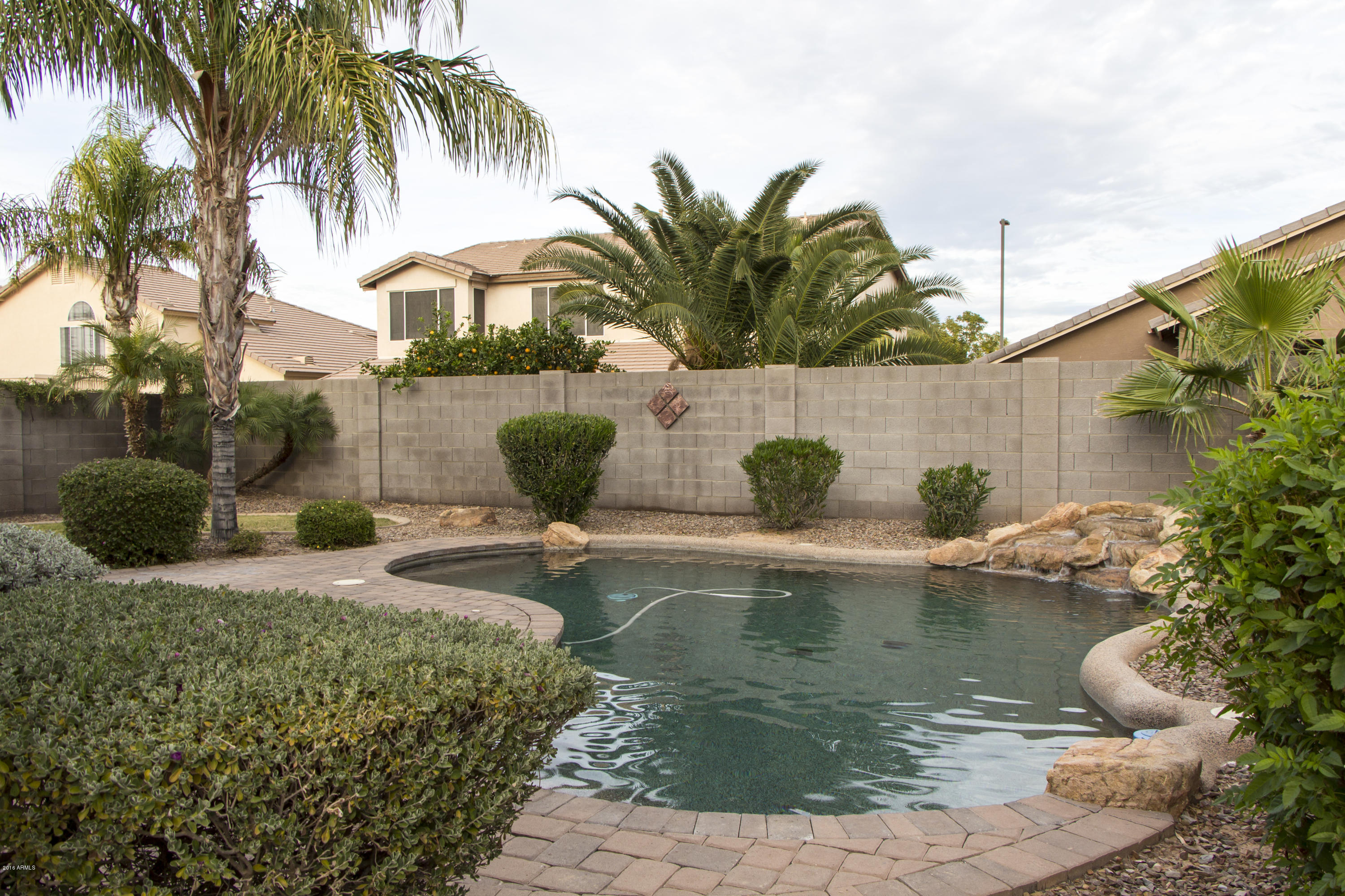 3517 South Sawmill Road Gilbert, AZ 85297 - Photo 3 of 26 a view of a swimming pool with a patio