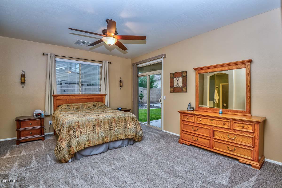6825 West Carson Road Laveen, AZ 85339 - Photo 11 of 18 Owner's Suite w/ Slider to Covered Patio