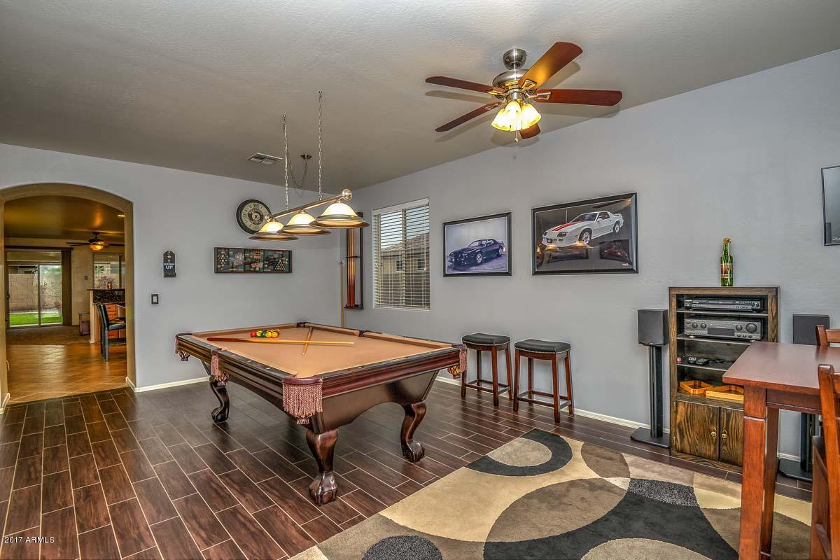 6825 West Carson Road Laveen, AZ 85339 - Photo 2 of 18 Game Room w/ "wood look" tile