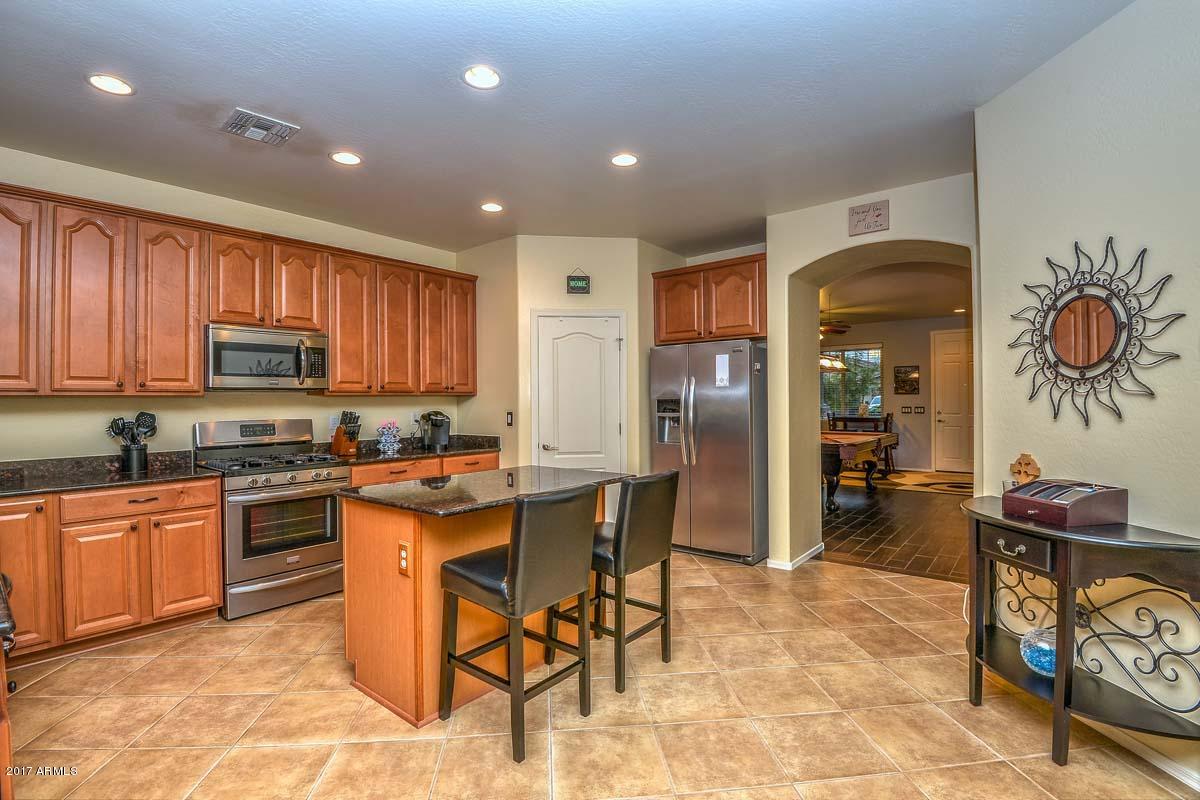 6825 West Carson Road Laveen, AZ 85339 - Photo 3 of 18 Upgraded Kitchen w/ Walk-in Pantry