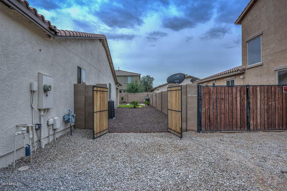6825 West Carson Road Laveen, AZ 85339 - Photo 10 of 18 RV Gate & plenty of Side Yard