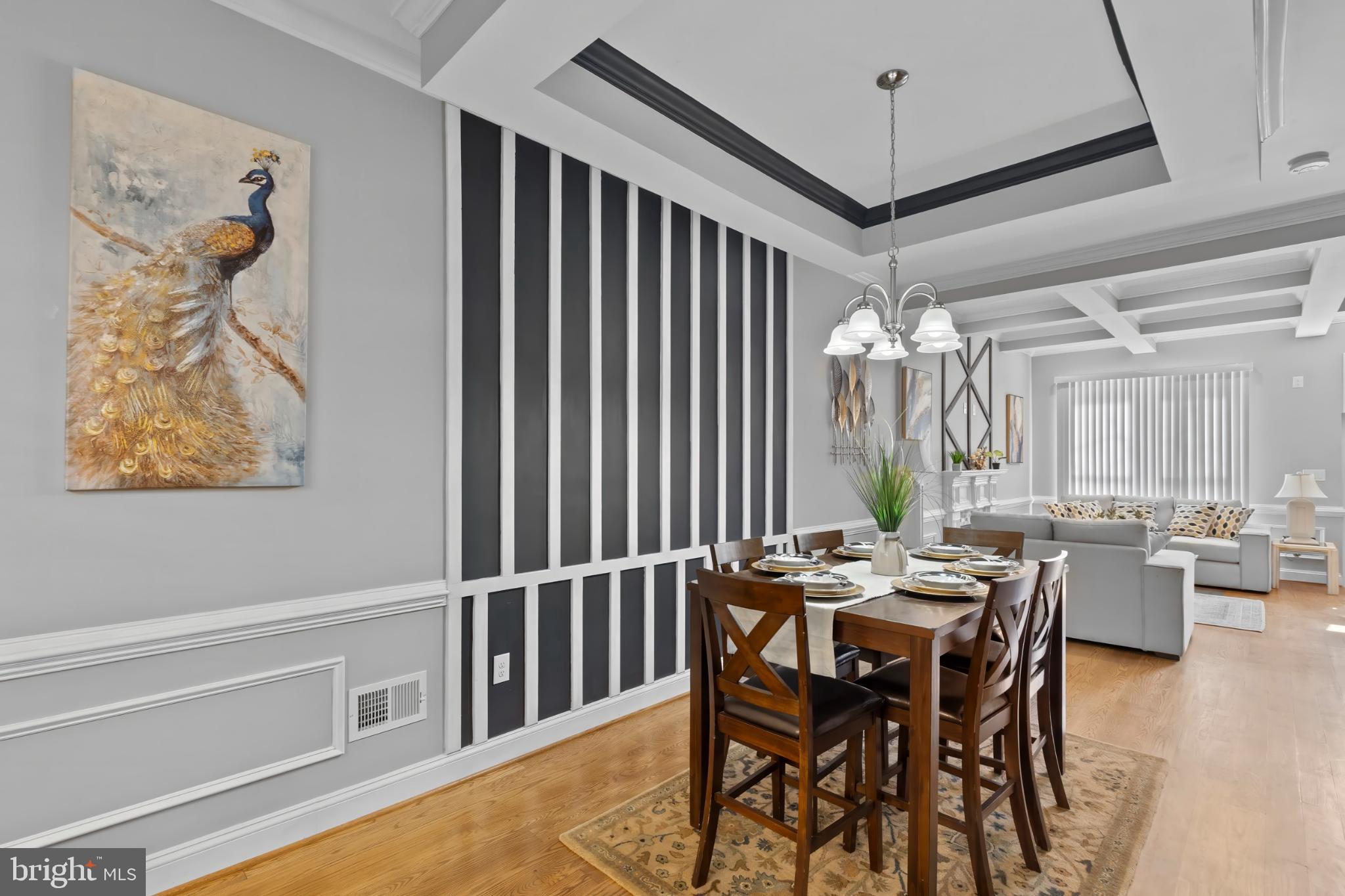 1330 Aisquith Street Baltimore, MD 21202 - Photo 15 of 47 a view of a dining room with furniture window and wooden floor