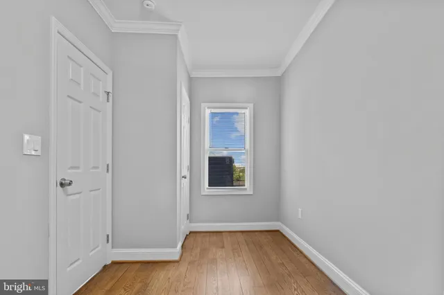 a view of a room that has a window in it