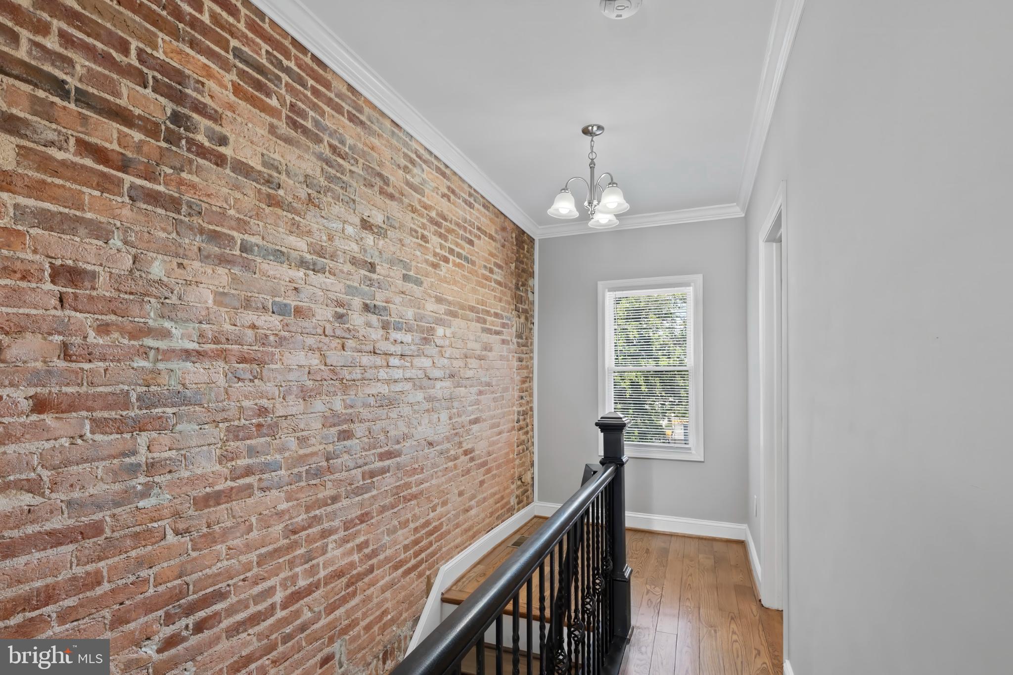 1330 Aisquith Street Baltimore, MD 21202 - Photo 34 of 47 a view of a hallway with windows