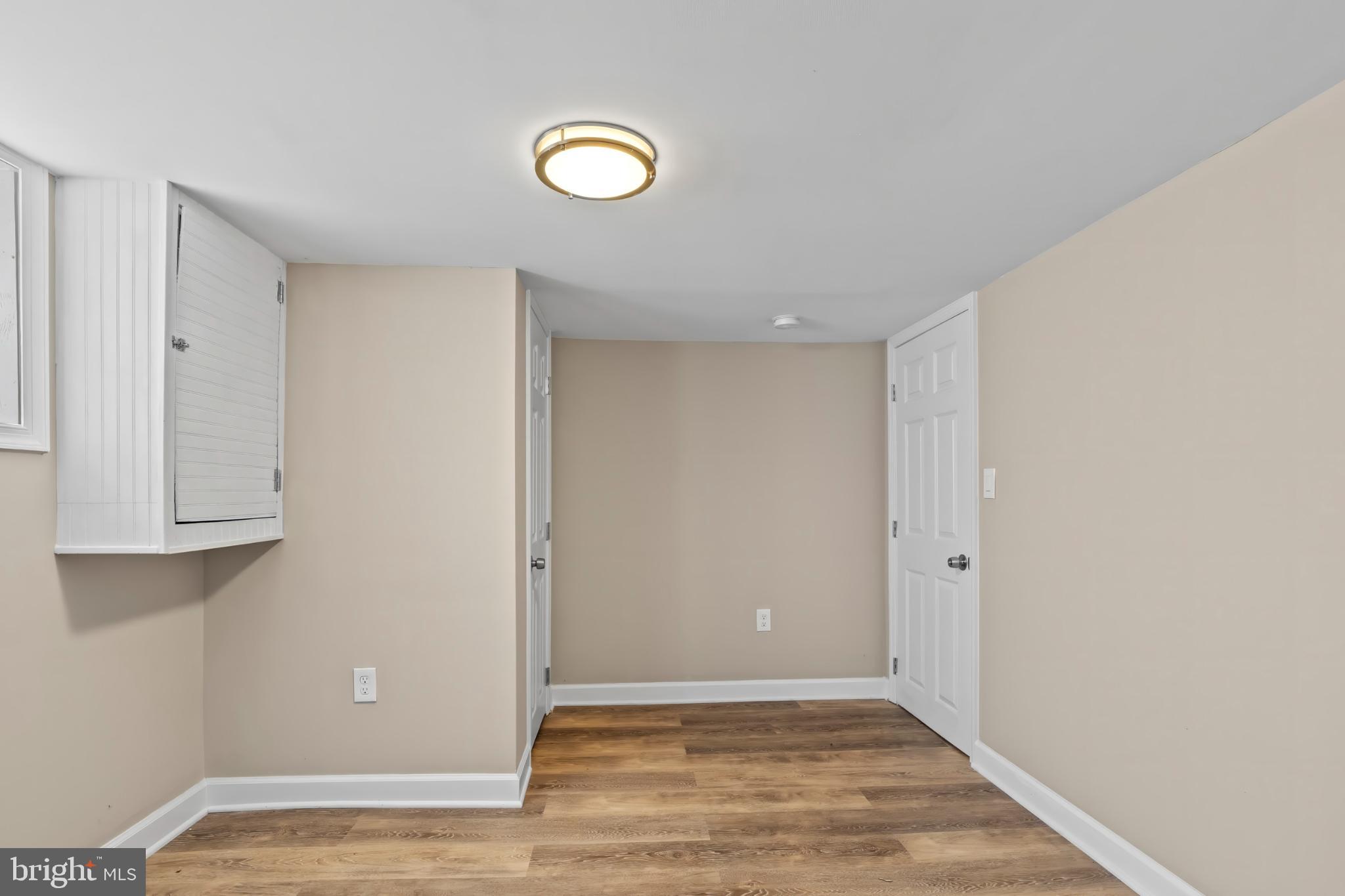 1330 Aisquith Street Baltimore, MD 21202 - Photo 40 of 47 a view of a livingroom with wooden floor