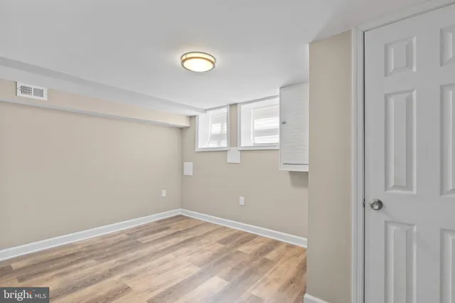 a view of a room that has a window in it