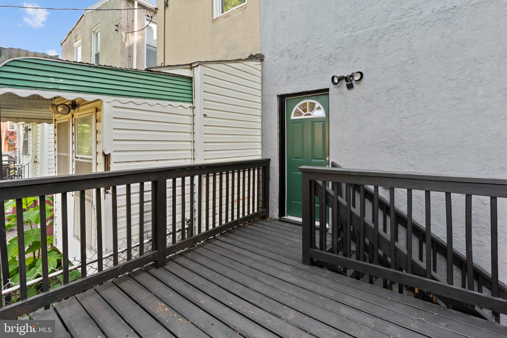 1330 Aisquith Street Baltimore, MD 21202 - Photo 44 of 47 a view of a wooden balcony with wooden floor