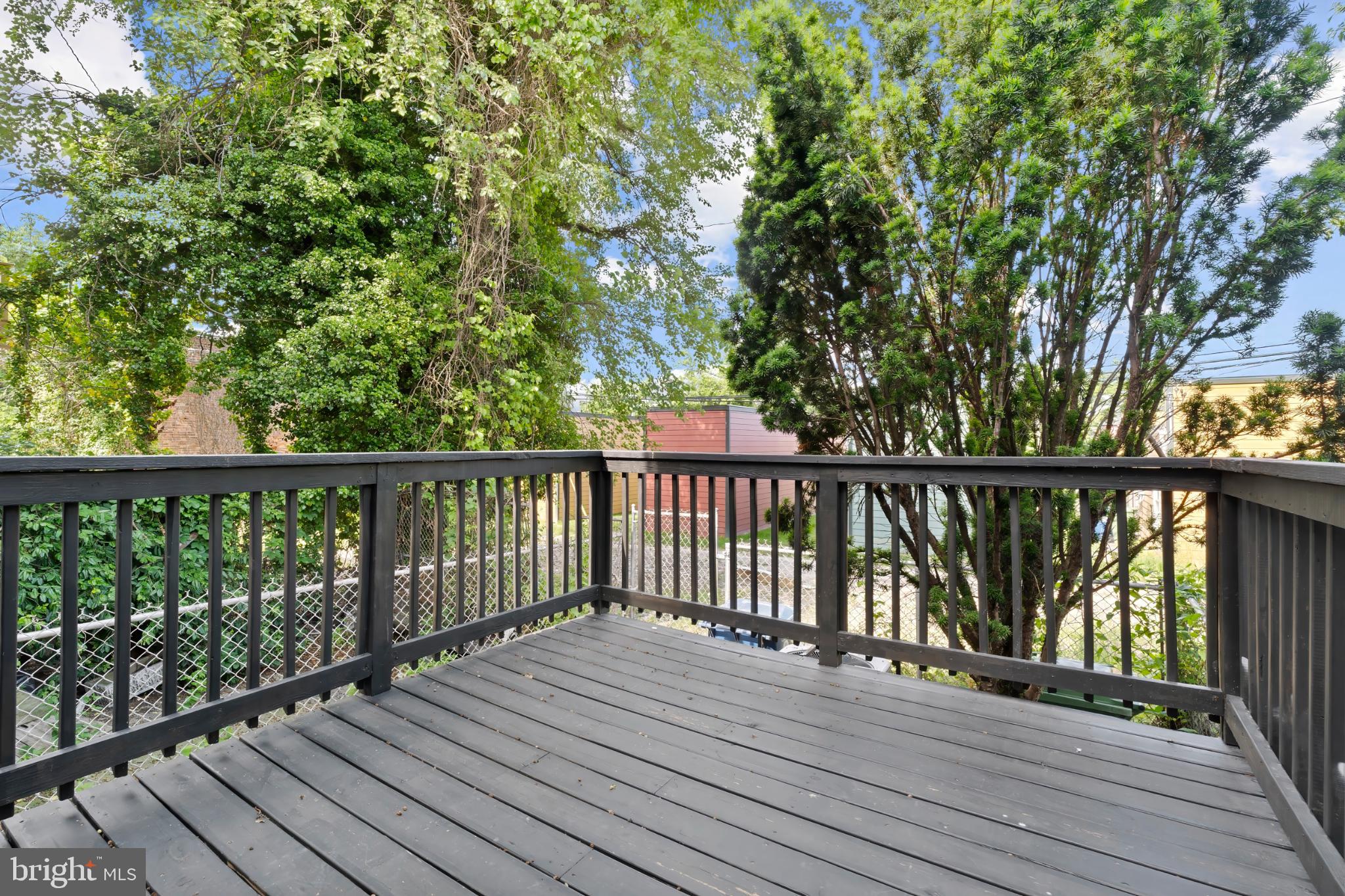 1330 Aisquith Street Baltimore, MD 21202 - Photo 45 of 47 a view of balcony with wooden floor