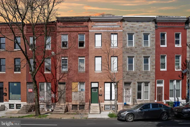 a car parked in front of a building