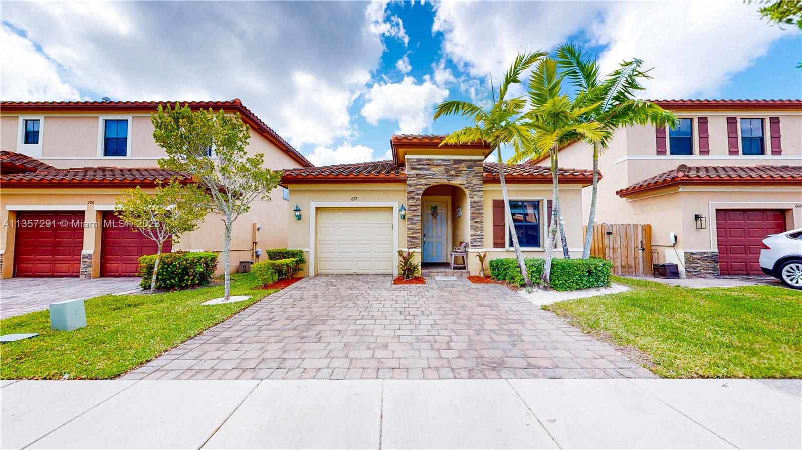 672 Southeast 34th Avenue Homestead, FL 33033 - Photo 45 of 65 a front view of house with yard