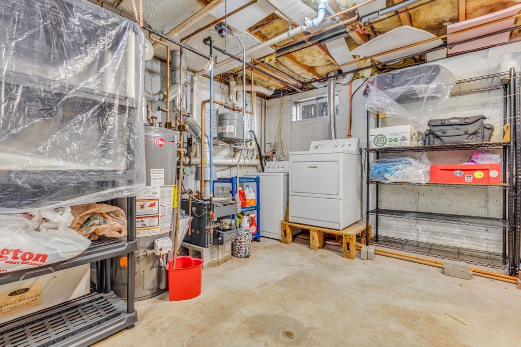 46 Vincent Circle Worcester, MA 01604 - Photo 25 of 27 a storage room with utility racks