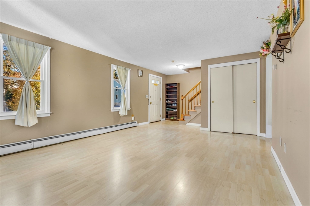 46 Vincent Circle Worcester, MA 01604 - Photo 8 of 27 a view of an empty room with a window