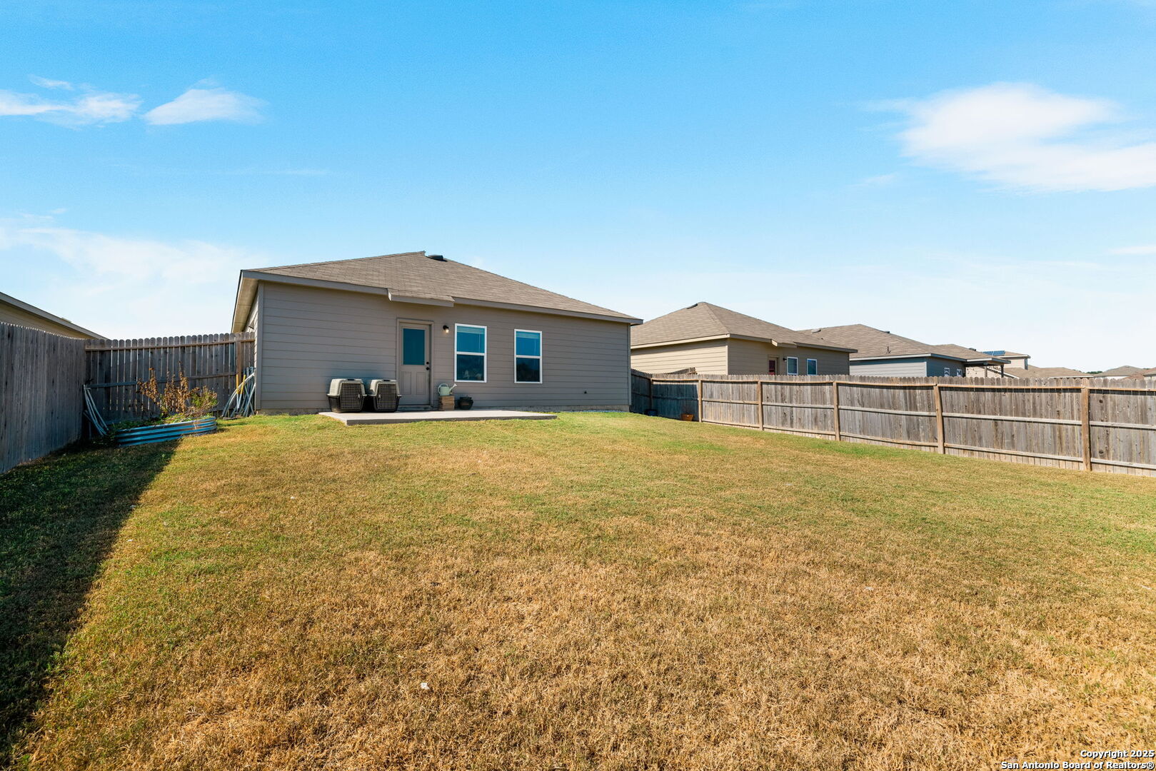 7311 Marina Del Rey Converse, TX 78109 - Photo 23 of 25 a large house with a big yard and large trees