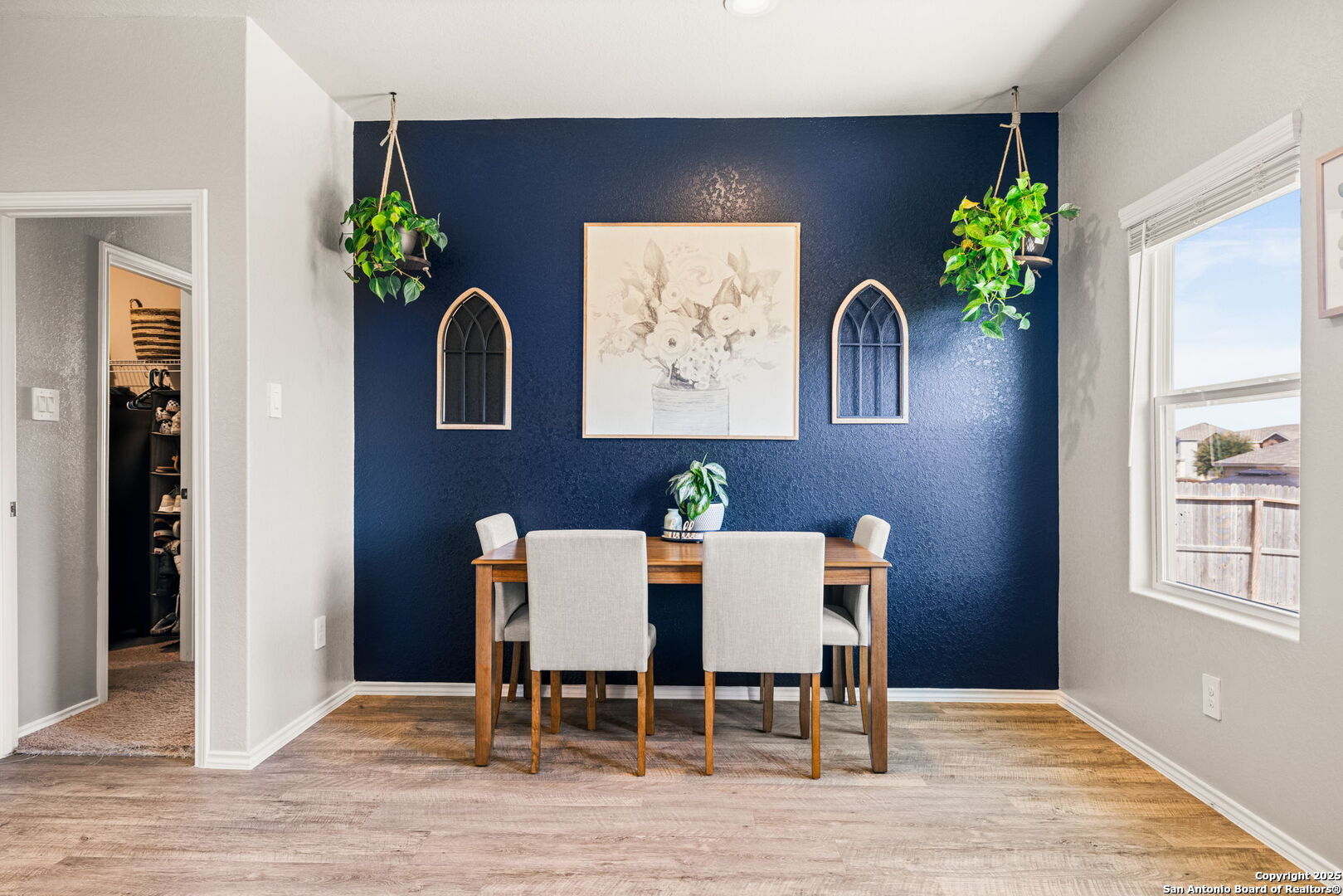 7311 Marina Del Rey Converse, TX 78109 - Photo 3 of 25 a view of a dining room with furniture and wooden floor