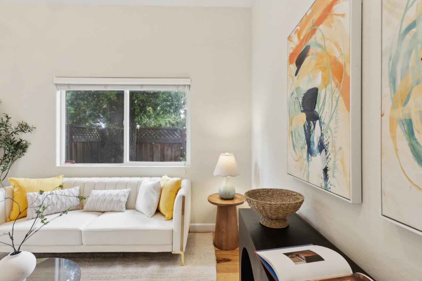 731 Calderon Avenue Mountain View, CA 94041 - Photo 11 of 55 a living room with furniture and a window