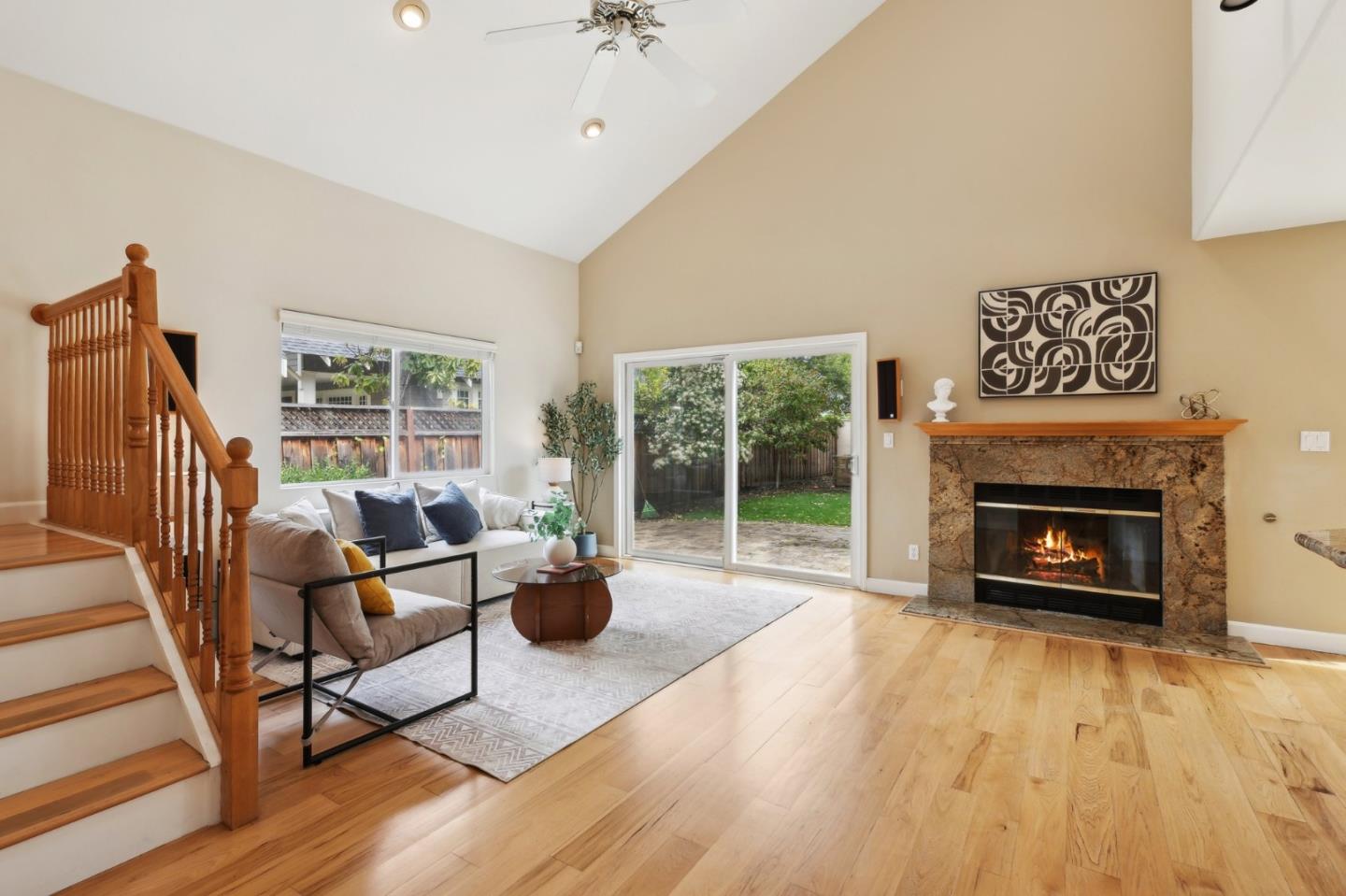 731 Calderon Avenue Mountain View, CA 94041 - Photo 14 of 55 a living room with furniture and a fireplace