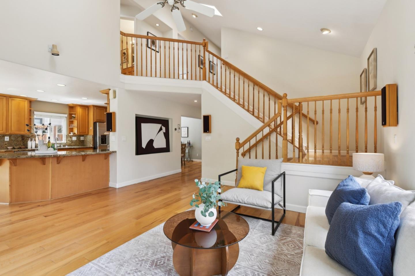 731 Calderon Avenue Mountain View, CA 94041 - Photo 16 of 55 a living room with furniture and a kitchen view