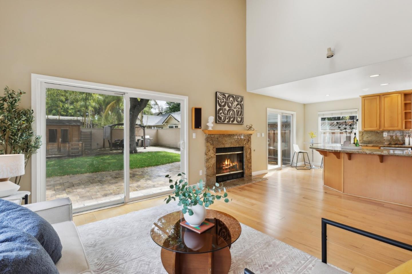 731 Calderon Avenue Mountain View, CA 94041 - Photo 17 of 55 a living room with furniture a floor to ceiling window and a floor to ceiling window