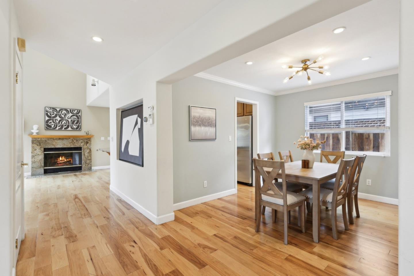 731 Calderon Avenue Mountain View, CA 94041 - Photo 18 of 55 a view of a dining room with furniture window and wooden floor