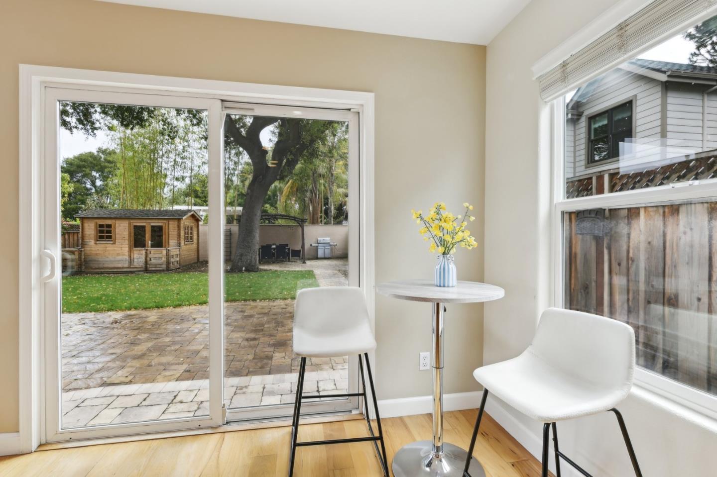 731 Calderon Avenue Mountain View, CA 94041 - Photo 28 of 55 a view of a dining room with furniture a livingroom view and wooden floor