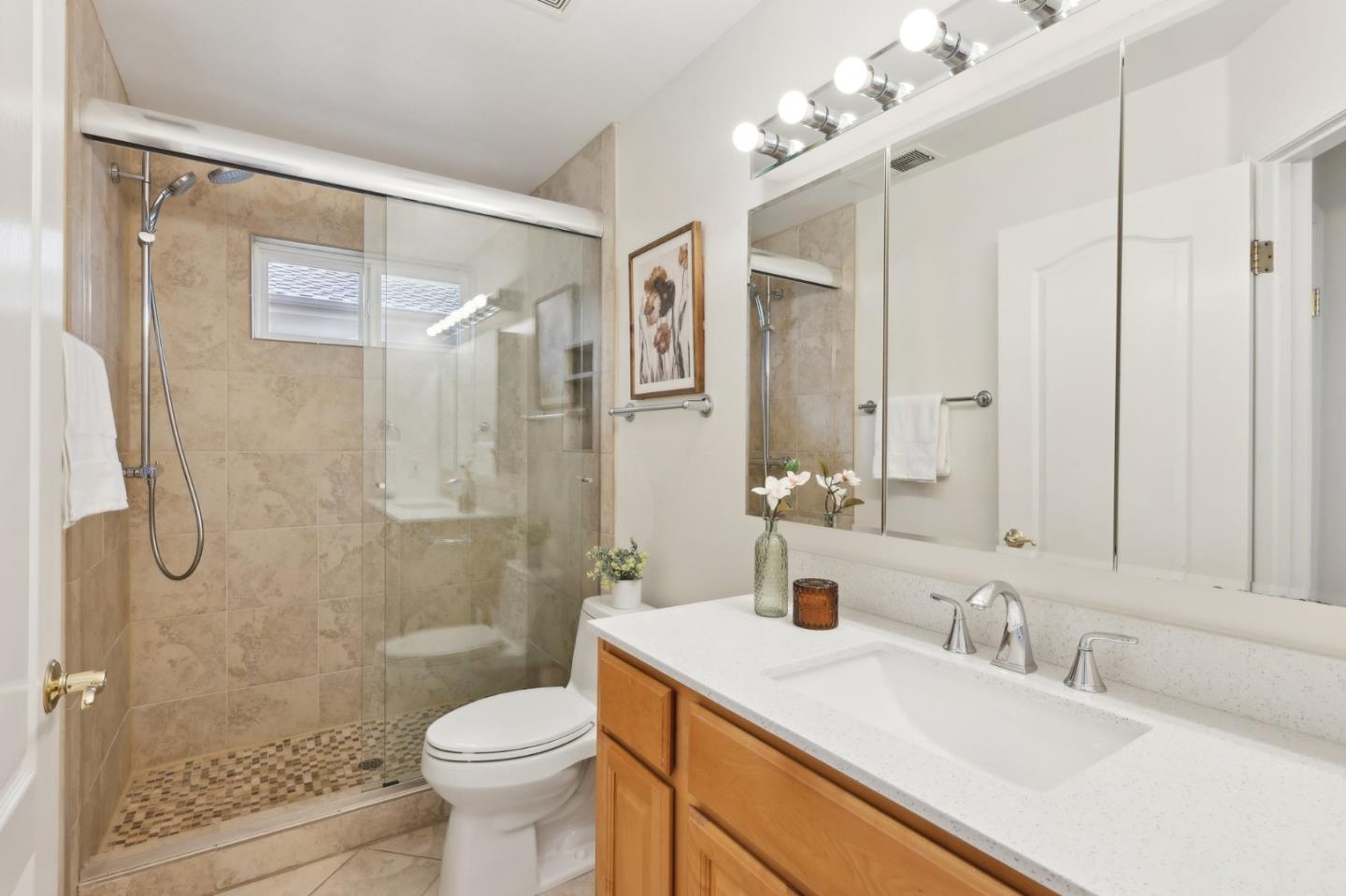 731 Calderon Avenue Mountain View, CA 94041 - Photo 29 of 55 a bathroom with a sink a toilet and shower