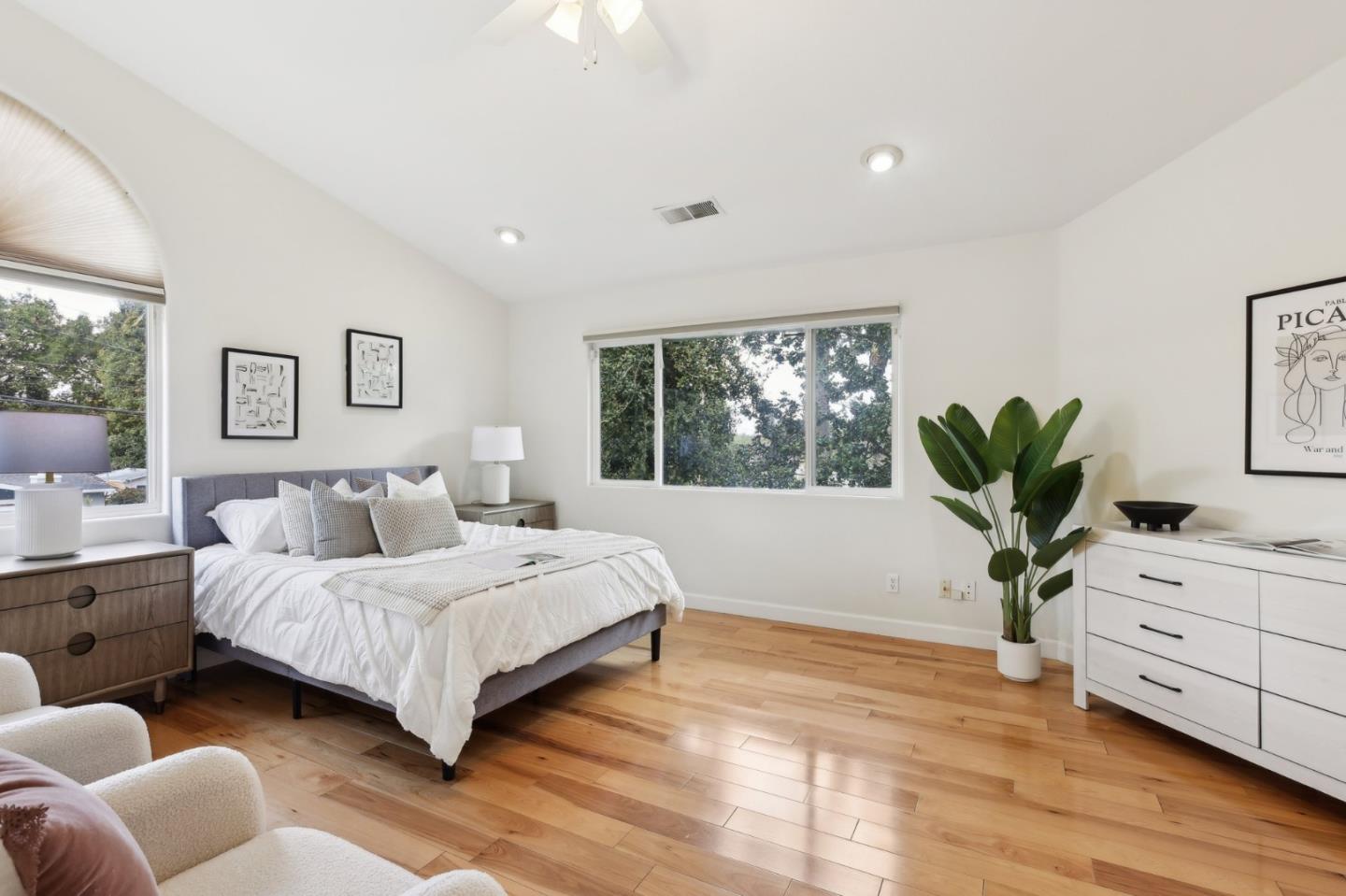 731 Calderon Avenue Mountain View, CA 94041 - Photo 36 of 55 a bedroom with a large bed and a couch