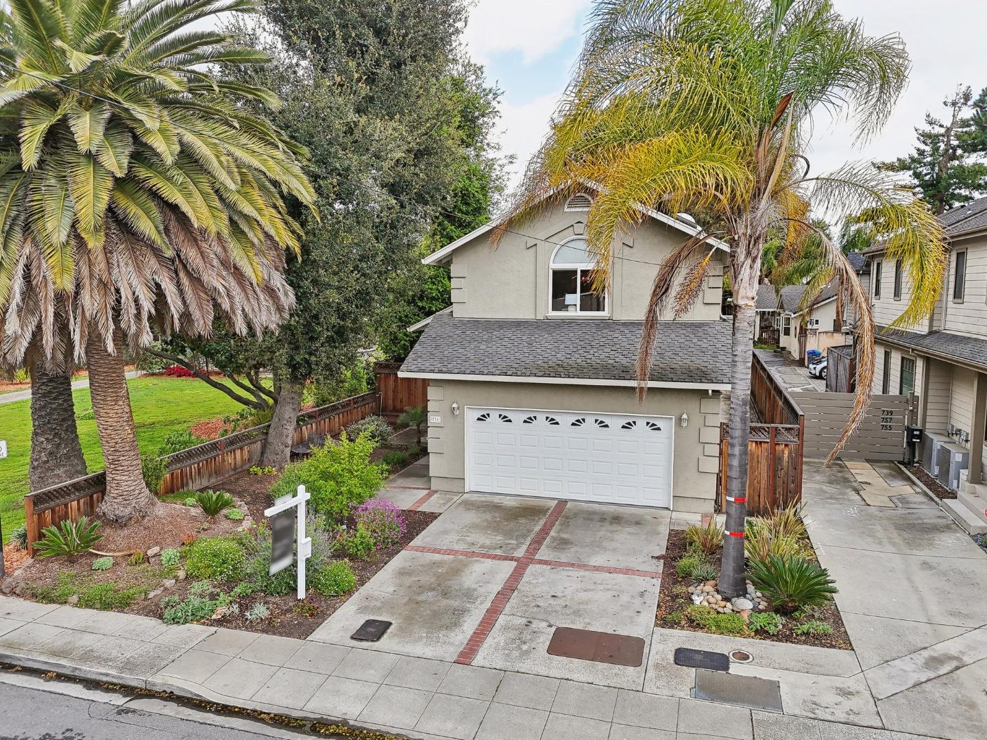731 Calderon Avenue Mountain View, CA 94041 - Photo 43 of 55 a front view of a house with garden