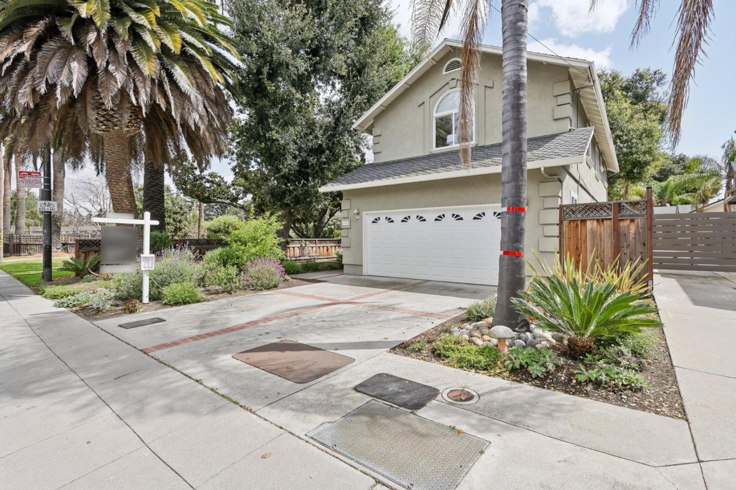 731 Calderon Avenue Mountain View, CA 94041 - Photo 55 of 55 a front view of a house with a garden