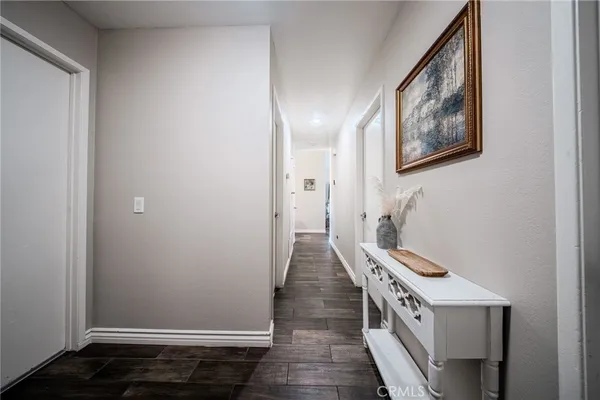a hallway with wooden floor