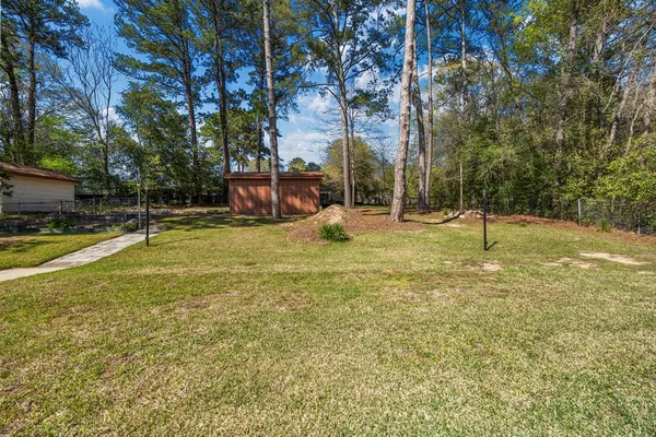 a view of a park with swings and slides