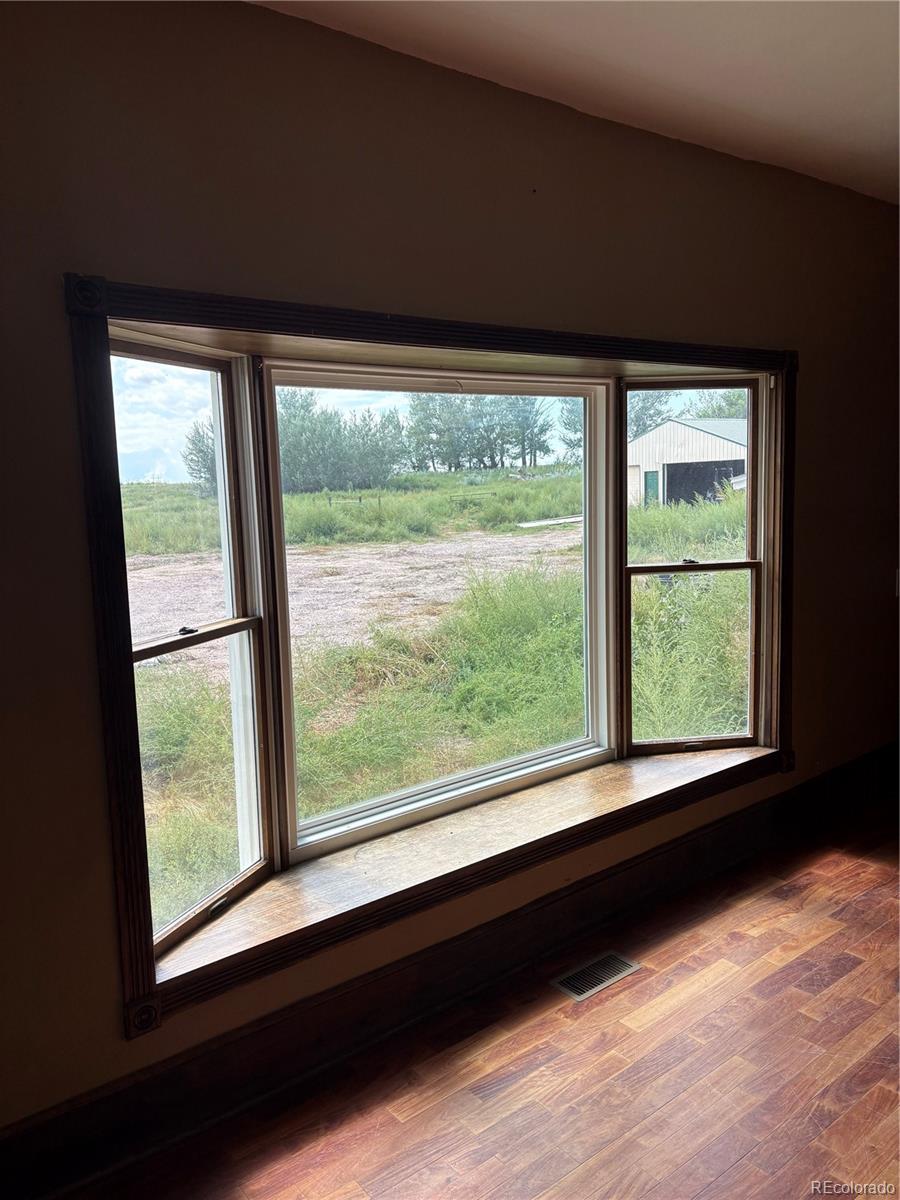 16154 County Road 24 Sterling, CO 80751 - Photo 15 of 28 a view of a large window with an outdoor view