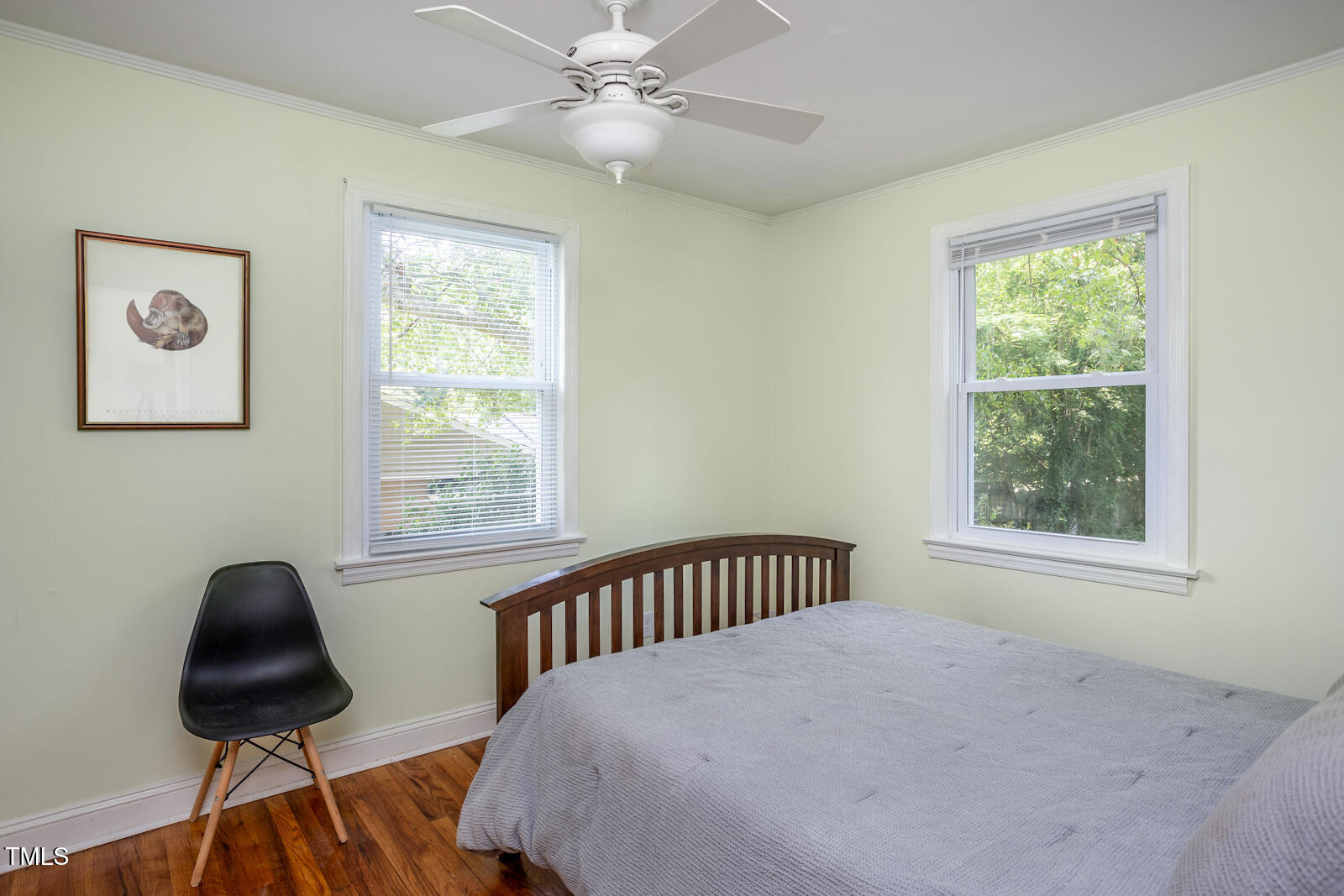 2331 Stevens Road Raleigh, NC 27610 - Photo 20 of 33 a bedroom with a bed and wooden floor