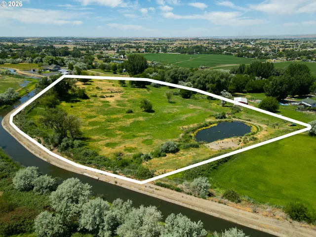 a view of swimming pool from a balcony