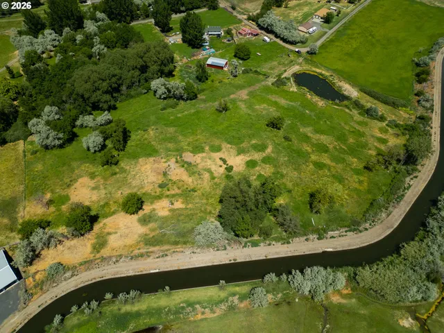 a view of swimming pool from a balcony