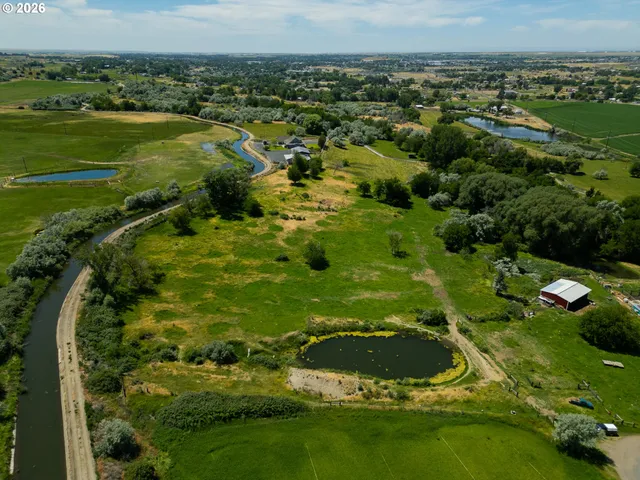 a view of a lake with a garden