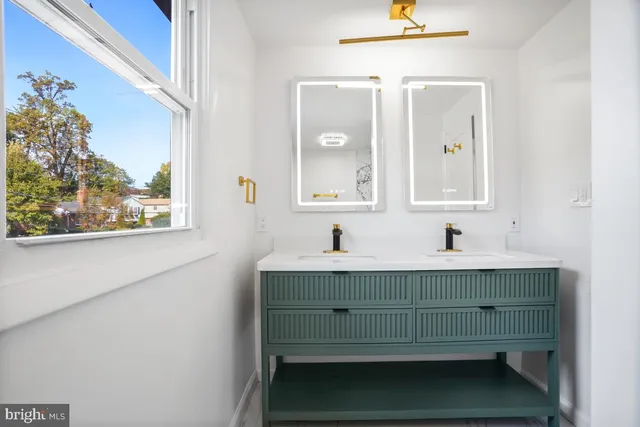 a bathroom with a toilet and a shower curtain