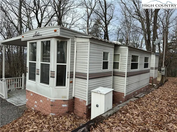 a view of a house and trees