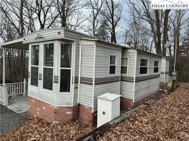 a view of a house and trees
