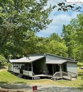 a view of swimming pool with seating space