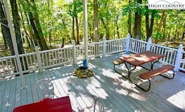 a view of a chairs and table on the wooden floor
