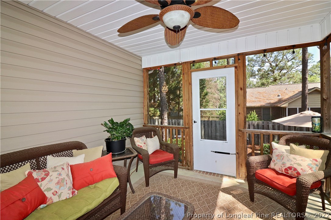25 Fox Run Road Pinehurst, NC 28374 - Photo 25 of 28 a outdoor living space with furniture and a potted plant