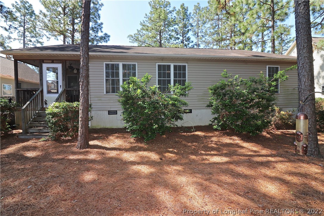 25 Fox Run Road Pinehurst, NC 28374 - Photo 28 of 28 front view of a house with a yard