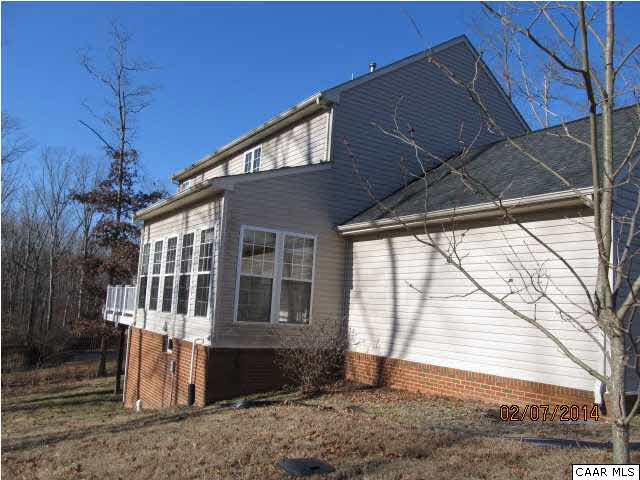 655 Reedy Creek Road Louisa, VA 23093 - Photo 9 of 10 a front view of a house with a yard