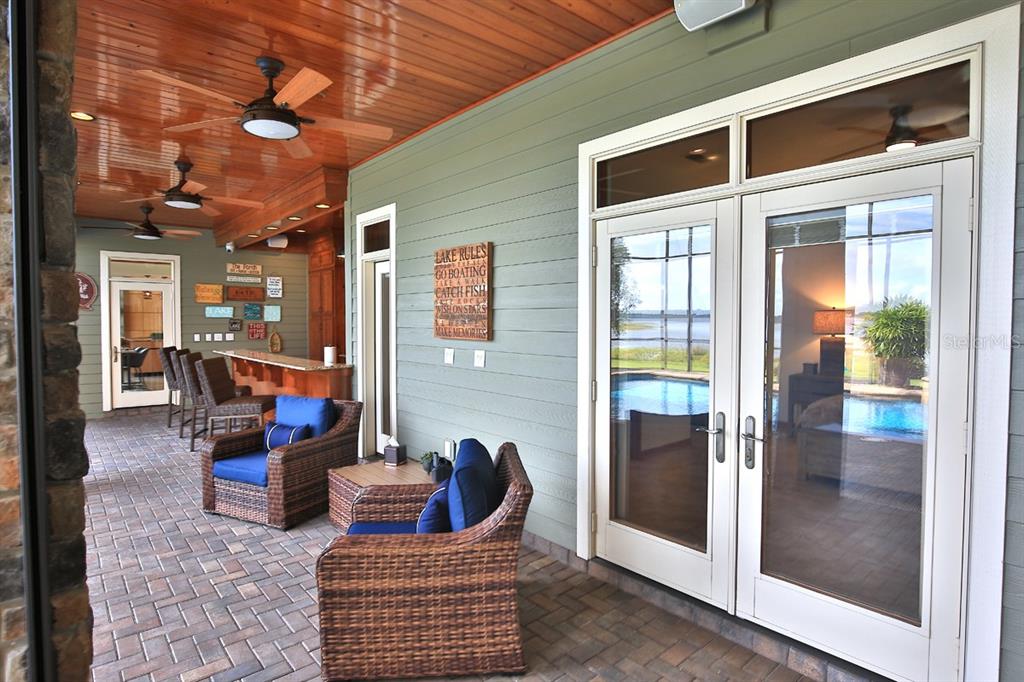11035 Southeast Sunset Harbor Road Summerfield, FL 34491 - Photo 73 of 97 a living room with furniture