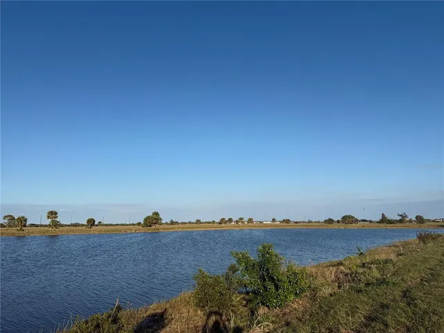 a view of lake and mountain