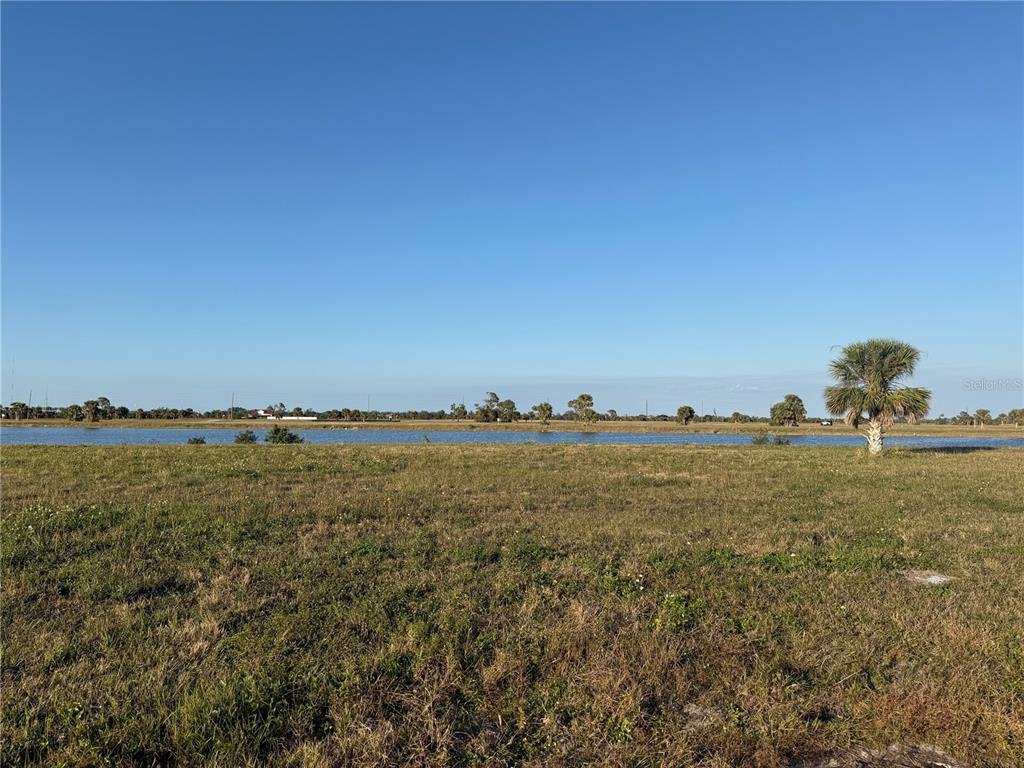 13 Laurel Court Placida, FL 33946 - Photo 5 of 12 a view of a lake and outdoor space