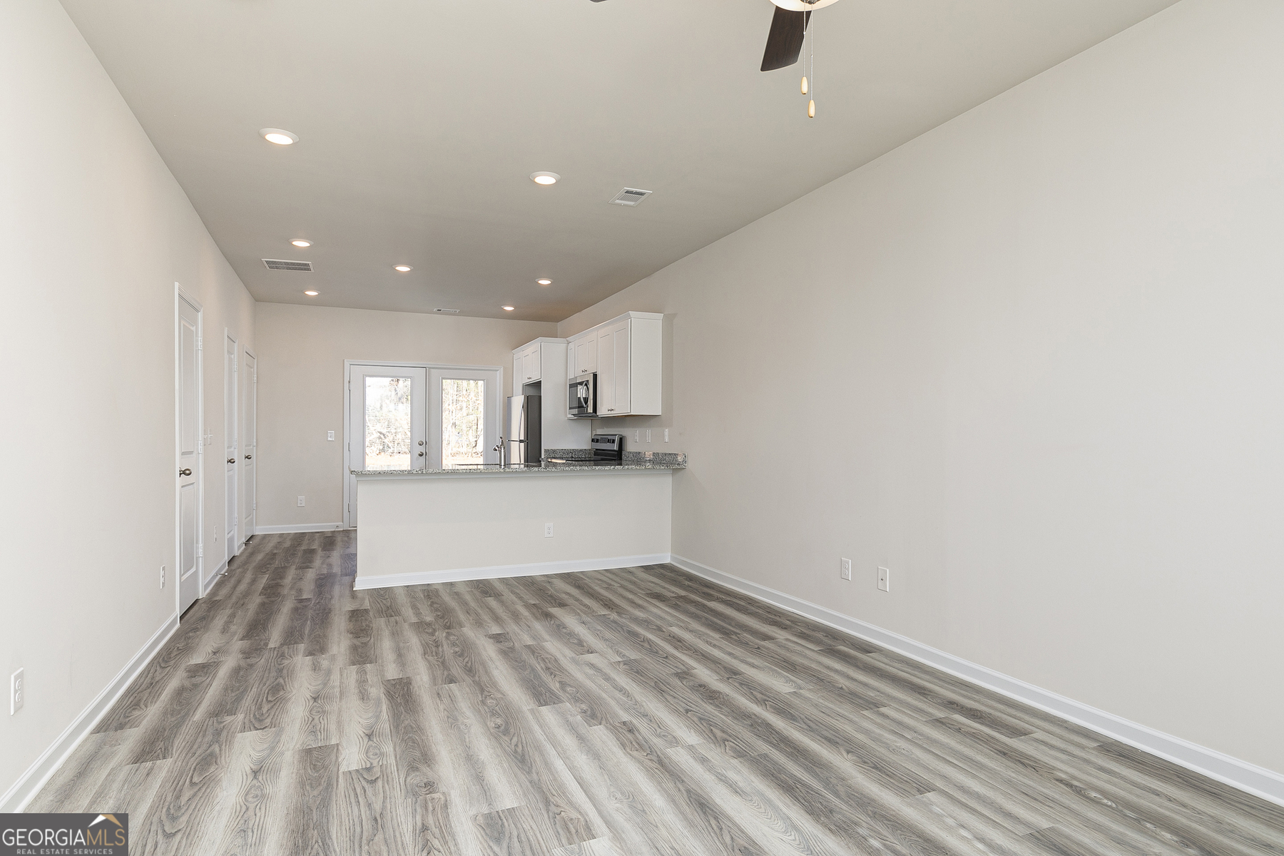 239 Rooker Drive LaGrange, GA 30241 - Photo 4 of 11 a view of kitchen and wooden floor